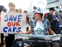 Vancouver Whitecaps supporters rally to demand that their team remain outside the Vancouver Convention Center during the FIFA conference on April 30, 2026 in Vancouver. 